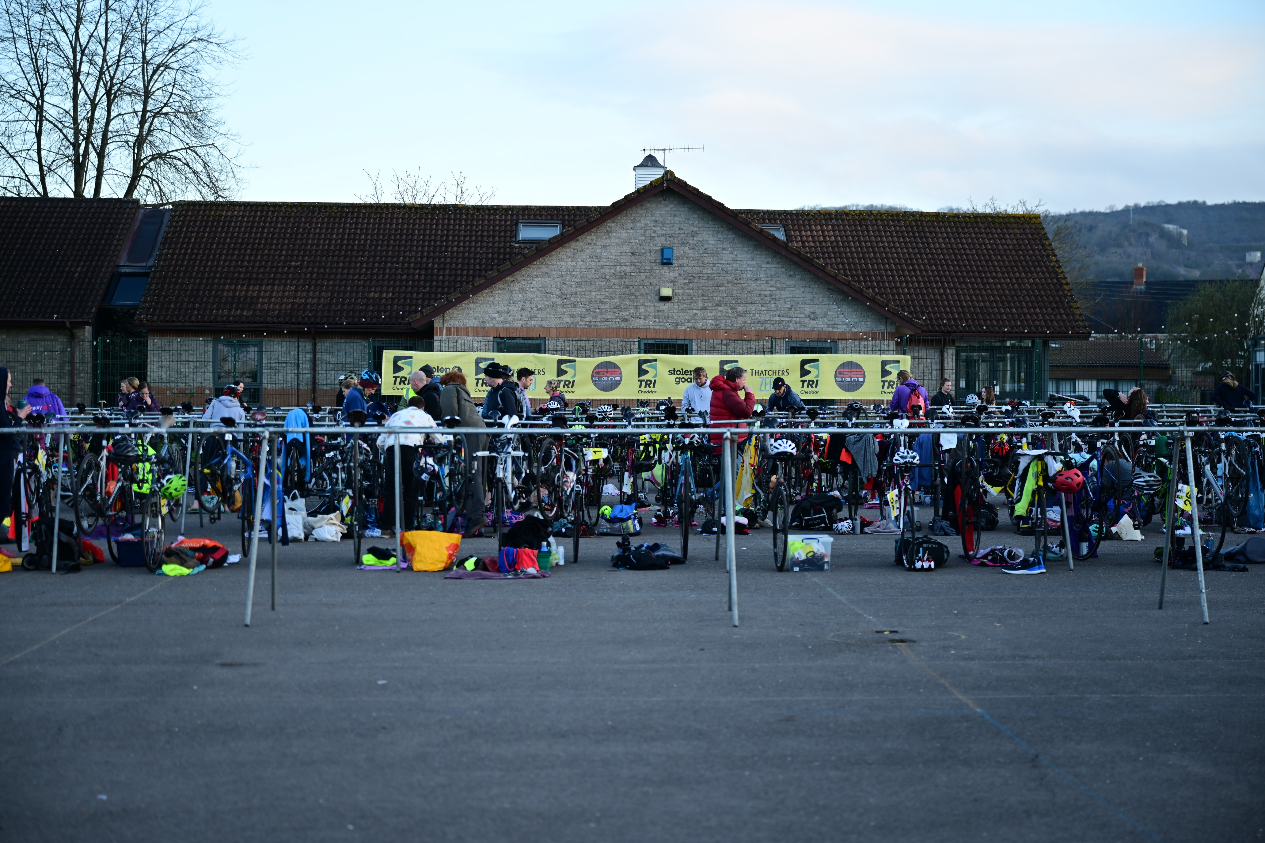 Sunrise over bike racks in transition at Kings of Cheddar